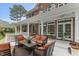 Covered porch offering a perfect spot for outdoor relaxation with comfortable seating at 7336 Barham Hollow Dr, Wake Forest, NC 27587