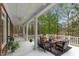 Spacious porch with seating, ideal for entertaining and relaxing outdoors at 7336 Barham Hollow Dr, Wake Forest, NC 27587
