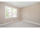 Bedroom featuring natural light, neutral walls, and plush carpet at 800 Laurel Garden Way, Cary, NC 27513