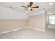 Bedroom with natural light, plush carpet, and a window seat at 800 Laurel Garden Way, Cary, NC 27513