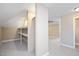 Spacious bedroom featuring neutral walls, carpet and closet space with built in shelving at 800 Laurel Garden Way, Cary, NC 27513
