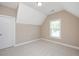 Bedroom with natural light, neutral walls, and plush carpet at 800 Laurel Garden Way, Cary, NC 27513