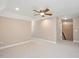 Spacious bonus room with neutral carpet, paint, and ample lighting at 800 Laurel Garden Way, Cary, NC 27513