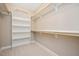 Spacious walk-in closet with built-in shelving and ample storage space at 800 Laurel Garden Way, Cary, NC 27513