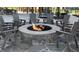 Gather around the inviting stone fire pit and enjoy evenings under the stars at 817 Central Pk Dr, Raleigh, NC 27604