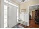 Inviting foyer featuring wood floors and a welcoming bench and decor at 8308 Buck Crossing Dr, Durham, NC 27713