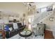 Open living room with hardwood floors, staircase and balcony at 8308 Buck Crossing Dr, Durham, NC 27713