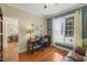 Inviting office with hardwood floors, a ceiling fan, and natural light at 8308 Buck Crossing Dr, Durham, NC 27713
