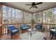 Screened porch offers comfortable seating, ceiling fan, and relaxing outdoor living space at 8308 Buck Crossing Dr, Durham, NC 27713