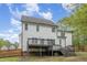 This home features a back deck, a large backyard, and a well-maintained exterior with beautiful landscaping at 9332 Carley Cir, Garner, NC 27529
