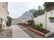 Charming backyard with raised garden beds, perfect for gardening and outdoor enjoyment at 1008 Double Spring Ct, Apex, NC 27502