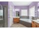 Spacious bathroom with a large soaking tub and separate shower area at 1008 Double Spring Ct, Apex, NC 27502