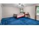 Cozy bedroom featuring neutral walls, carpet, and classic furnishings at 1008 Double Spring Ct, Apex, NC 27502