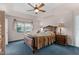 Charming bedroom with a unique sleigh bed and neutral wall colors at 1008 Double Spring Ct, Apex, NC 27502