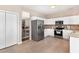 Well-equipped kitchen featuring stainless steel appliances and granite countertops at 103 Woolard Way, Apex, NC 27502