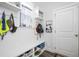 Functional mudroom with bench, storage, and access to the entrance at 105 Smoky Emerald Way, Holly Springs, NC 27540