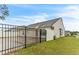 Property backyard with fenced in patio area and a partial view of the back of the home at 1054 Weathervane Hill Dr, Rocky Mount, NC 27803