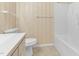 Bathroom featuring toilet and tub/shower combo, enhanced by patterned wallpaper at 1054 Weathervane Hill Dr, Rocky Mount, NC 27803