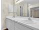 Bathroom features double sink vanity with white cabinets and undermount sinks at 1054 Weathervane Hill Dr, Rocky Mount, NC 27803