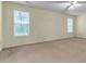 Spacious bedroom with carpet flooring, neutral paint, ceiling fan and lots of natural light at 1054 Weathervane Hill Dr, Rocky Mount, NC 27803