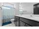 Bathroom features dual sinks with grey cabinets and marble flooring at 109 Broadwater Dr, Wake Forest, NC 27587