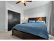 Bedroom with a modern ceiling fan, and dark wood furnishings at 109 Broadwater Dr, Wake Forest, NC 27587