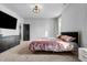 Bright bedroom featuring plush carpet, a modern bedframe, stylish curtains and black dresser at 109 Broadwater Dr, Wake Forest, NC 27587