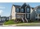 Stylish two-story home showcasing a welcoming front porch and attractive exterior at 109 Broadwater Dr, Wake Forest, NC 27587