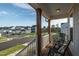 Relaxing front porch view with rocking chairs, offering a serene outdoor living space and neighborhood view at 109 Broadwater Dr, Wake Forest, NC 27587
