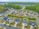 Expansive aerial view of a neighborhood featuring well-maintained homes and lush green landscaping at 109 Oak Rise Ln, Fuquay Varina, NC 27526