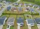 Aerial view showcases the home, neighboring properties, and the community's layout from above at 109 Oak Rise Ln, Fuquay Varina, NC 27526