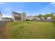 Large fenced in backyard with covered patio at 109 Oak Rise Ln, Fuquay Varina, NC 27526