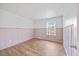 Bedroom with chair railing and wood floors at 109 Oak Rise Ln, Fuquay Varina, NC 27526