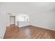 Bright and spacious bonus room with hardwood floors and a large window at 109 Oak Rise Ln, Fuquay Varina, NC 27526