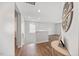 Upstairs hallway featuring wood floors and natural light at 109 Oak Rise Ln, Fuquay Varina, NC 27526