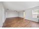 Inviting living room with attractive flooring, a ceiling fan, and lots of natural light at 109 Oak Rise Ln, Fuquay Varina, NC 27526