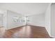 Bright and spacious living room with hardwood floors, large windows, and ample natural light at 109 Oak Rise Ln, Fuquay Varina, NC 27526