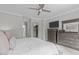 Cozy bedroom features a comfortable bed and a television mounted above a dark wood dresser at 109 Yorkchester Way, Raleigh, NC 27615