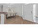 Elegant dining room featuring hardwood floors and a grand chandelier at 109 Yorkchester Way, Raleigh, NC 27615