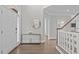 Inviting foyer features hardwood floors and staircase at 109 Yorkchester Way, Raleigh, NC 27615