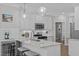 Kitchen with granite countertops, stainless steel appliances, and a breakfast bar with seating at 109 Yorkchester Way, Raleigh, NC 27615