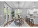 Bright dining area with French doors and an adjacent kitchen perfect for entertaining at 1104 Hobson Ct, Raleigh, NC 27607