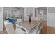 Open-concept living and dining area with a modern, neutral color scheme at 1104 Hobson Ct, Raleigh, NC 27607