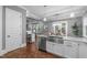 Open concept kitchen with stainless appliances, adjacent dining area and access to living room at 1104 Hobson Ct, Raleigh, NC 27607