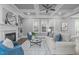 Bright living room featuring a cozy fireplace, built-in shelves, and coffered ceiling at 1104 Hobson Ct, Raleigh, NC 27607