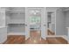View into main bedroom with ensuite bathroom and custom closet at 1104 Hobson Ct, Raleigh, NC 27607