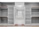 Bright walk-in closet with custom shelving and ample storage space at 1104 Hobson Ct, Raleigh, NC 27607