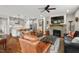 Open concept floor plan with kitchen, living room and stone fireplace for entertaining at 1108 Cadence Ln, Durham, NC 27703