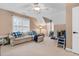 Spacious, carpeted bonus room with natural light and play area at 1113 Colonial Club Road Rd, Wake Forest, NC 27587