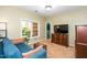 Cozy bonus room with ample natural light and walk-in closet at 1114 Glenolden Ct, Cary, NC 27513